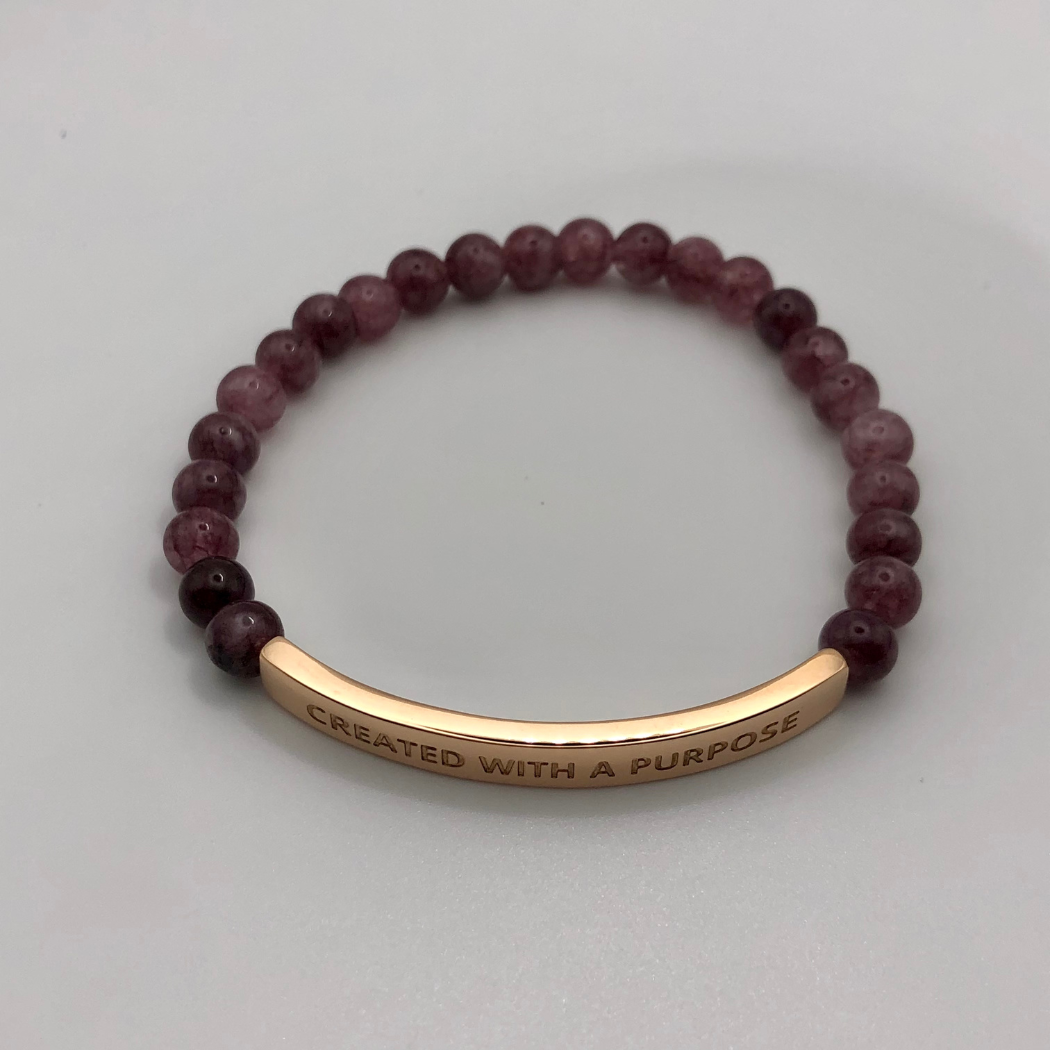 Intricate Gemstone bead bracelet with a purposeful inscription