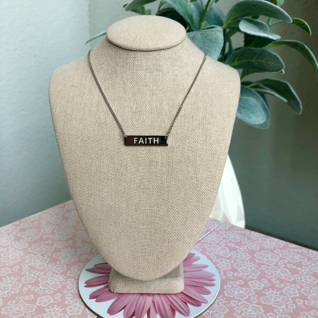 Silver necklace with Faith engraving