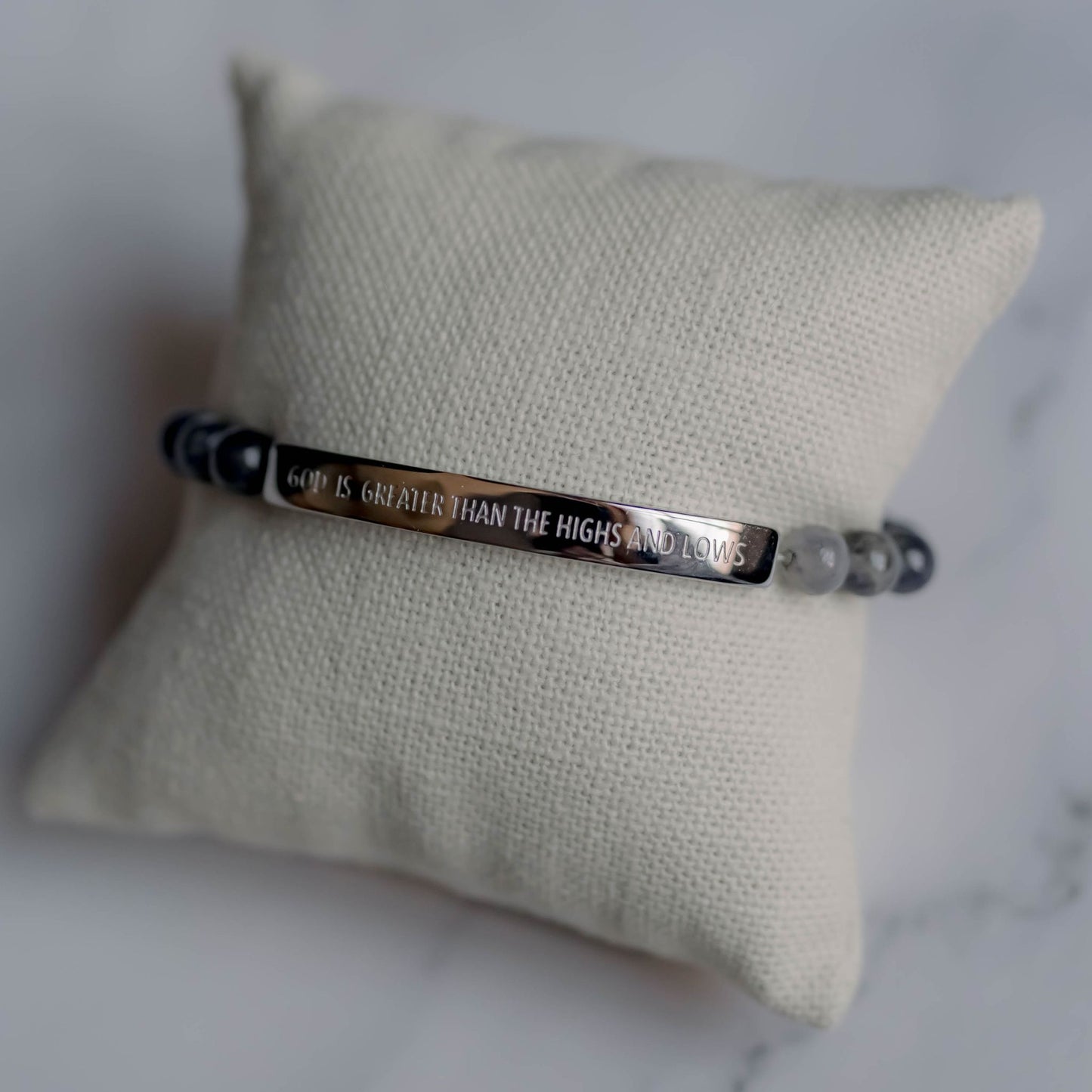 Close-up of 'God Is Greater Than The Highs And Lows' Bracelet