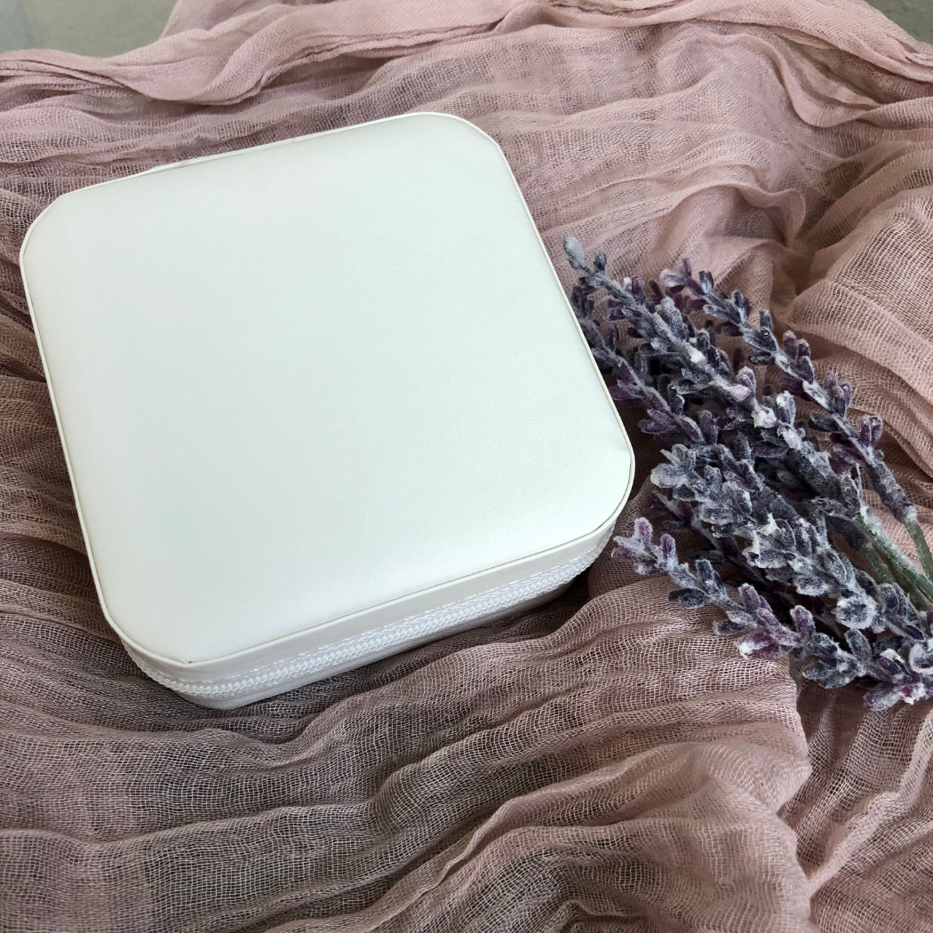 A beautifully designed jewelry organizer made from PU leather in white.