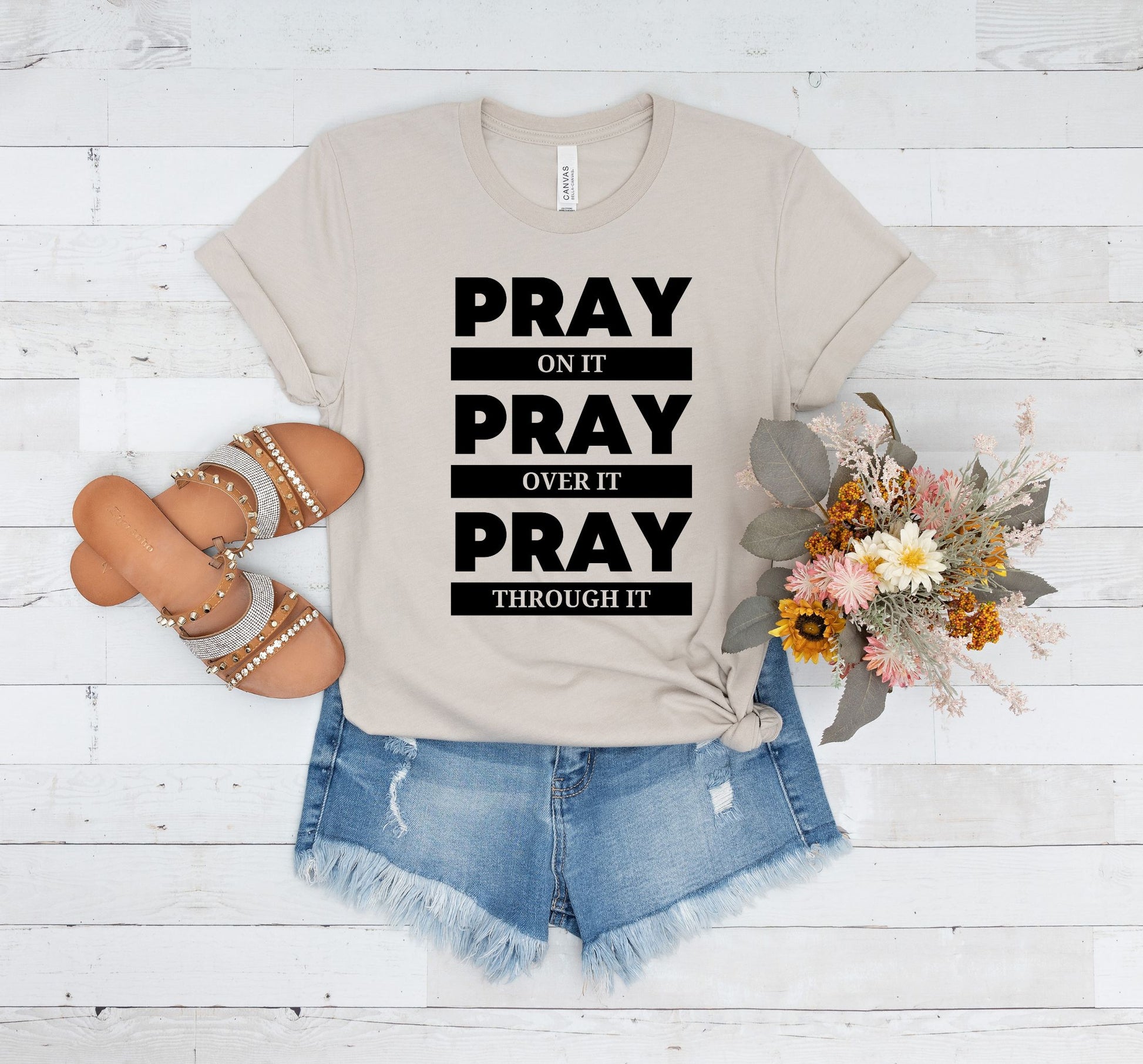 Bella Canvas 3001 t-shirt with "Pray On It, Over It, Through It" design